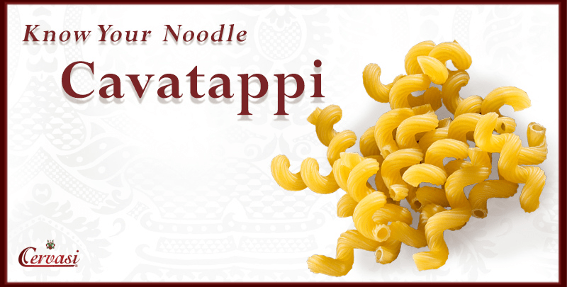 know-your-noodle-cavatappi-cervasi-blog Uncooked cavatappi pasta with caption "know your noodle"